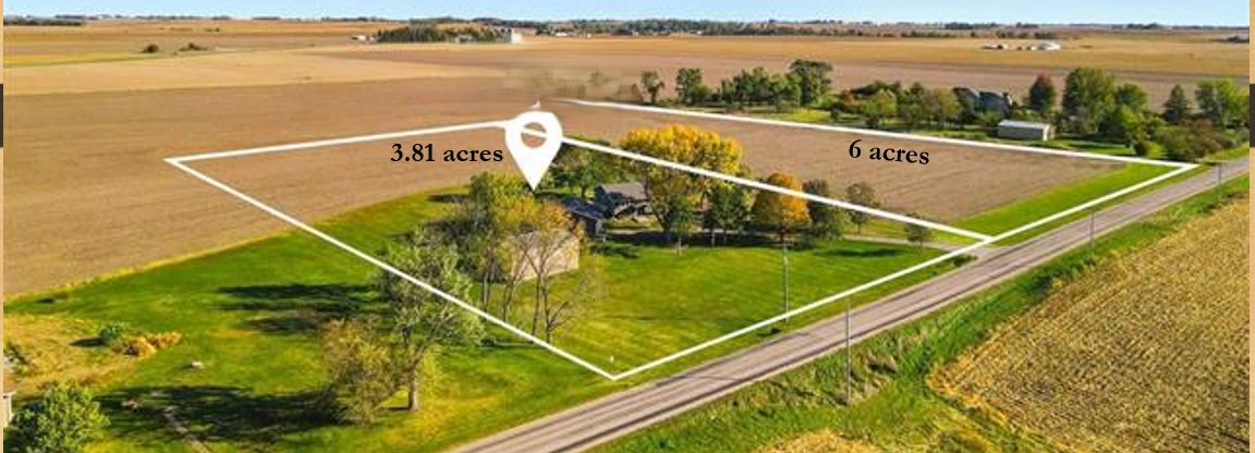 Aerial view of the Crosspoint Baptist Church property on Sioux Avenue SE, Iowa City, showing the church grounds and adjoining acreage